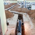 Interior utility trench installation
