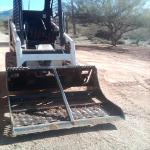 Landplane simplifies grading, leveling, removing sod, sorting debris, aerating, pulverizing and transporting material.