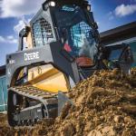 John Deere 333G Compact Track Loader for breakout force, wide track for stability and muscle to tote heavy loads.  It does a variety of grading, digging, back filling, and excavation jobs.  With the 90" bucket (equals 9 wheel barrels) it moves material fast.