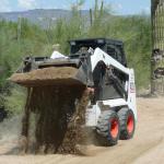 The compact S70 skid-steer loader is an agile little workhorse ideal for tight areas whenever the job is too big for a shovel and too small for a larger machine.